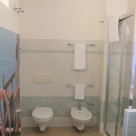 Отель Al 12 Di Casa Asinara
